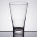 An Arcoroc Shetland highball glass on a table with a white background.
