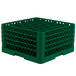 A green plastic Vollrath Traex glass rack with holes.