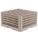 A beige plastic Vollrath glass rack with a grid of small compartments.