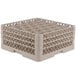 A beige Vollrath plastic glass rack with 30 compartments.