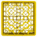 A yellow plastic Vollrath Traex glass rack with 30 hexagonal compartments.