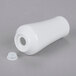 A white porcelain salt and pepper shaker set with a circular top.