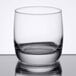 An Arcoroc Cabernet rocks glass with a reflection on the surface.