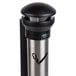 A Rubbermaid stainless steel cigarette receptacle with a black top.