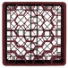 A red Vollrath Traex glass rack with hexagon compartments and metal structure.