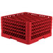 A red plastic Vollrath Traex rack with 30 compartments for holding small items.