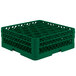 A green plastic Vollrath Traex glass rack with 30 hexagonal compartments.