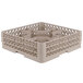 A beige plastic Vollrath Traex glass rack with 30 compartments.