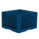 A blue plastic Vollrath Traex glass rack with many compartments and holes.