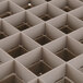 A Vollrath Traex beige glass rack with a grid of squares.