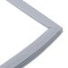 A white vinyl magnetic door gasket with a gray magnetic strip.