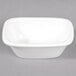 A white rectangular porcelain bowl with a lid.