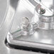 A close-up of a silver metal Nemco thumb screw.