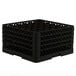 A black plastic Vollrath Traex glass rack with many compartments and holes.