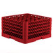 A red plastic Vollrath Traex glass rack with rows of empty compartments.