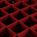 A red square grid with black squares.
