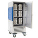 A large metal cabinet with adjustable lip load slides holding silver bowls.