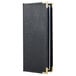 A black leather Menu Solutions Royal Select menu cover with gold trim.