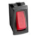 A close-up of a red light switch with a black plastic case.