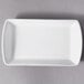 A white rectangular porcelain tid bit tray.