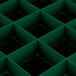 A green plastic grid with squares.