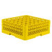 A yellow plastic Vollrath Traex glass rack with 36 compartments each with a hole for a small item.