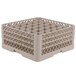 A beige Vollrath Traex glass rack with many compartments.