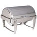 A Vollrath stainless steel roll top chafer on a counter.