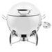 A Vollrath stainless steel round soup chafer with a lid.