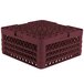 A burgundy Vollrath Traex glass rack with 36 compartments.