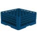 A Vollrath Traex royal blue plastic rack with 36 cylindrical compartments with holes.