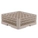 A beige Vollrath Traex glass rack with many small compartments.