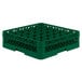A green plastic Vollrath Traex glass rack with many compartments and holes.