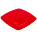 A red square CAC stoneware plate.