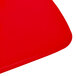 A red square stoneware plate.