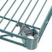 A Metro Super Erecta wire shelf with a grey Metroseal handle.