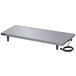 A rectangular metal Hatco heated shelf on a table.