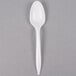 A white plastic Dart teaspoon with a white handle.