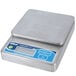 An Edlund Poseidon digital portion scale on a counter with a blue display.