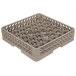 A beige plastic Vollrath Traex glass rack with a grid of 42 compartments.