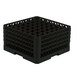 A black plastic Vollrath Traex glass rack with many compartments.