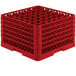 A red plastic Vollrath glass rack with many compartments.