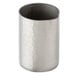 An American Metalcraft stainless steel creamer with a hammered texture and a black handle.
