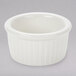 A white fluted Tuxton ramekin.