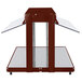 A brown metal Hatco buffet warmer shelf with glass shelves on a brown and clear glass table.