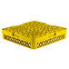 A yellow plastic Vollrath Traex glass rack with 49 compartments and a grid pattern.