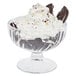 A glass Arcoroc dessert dish with chocolate and whipped cream on it.
