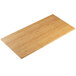 A Cal-Mil bamboo rectangular riser shelf on a table.
