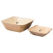 A stack of Eco-gecko palm leaf square bowls with a number 5 on one of them.