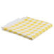 A folded yellow and white checkered vinyl table cover.